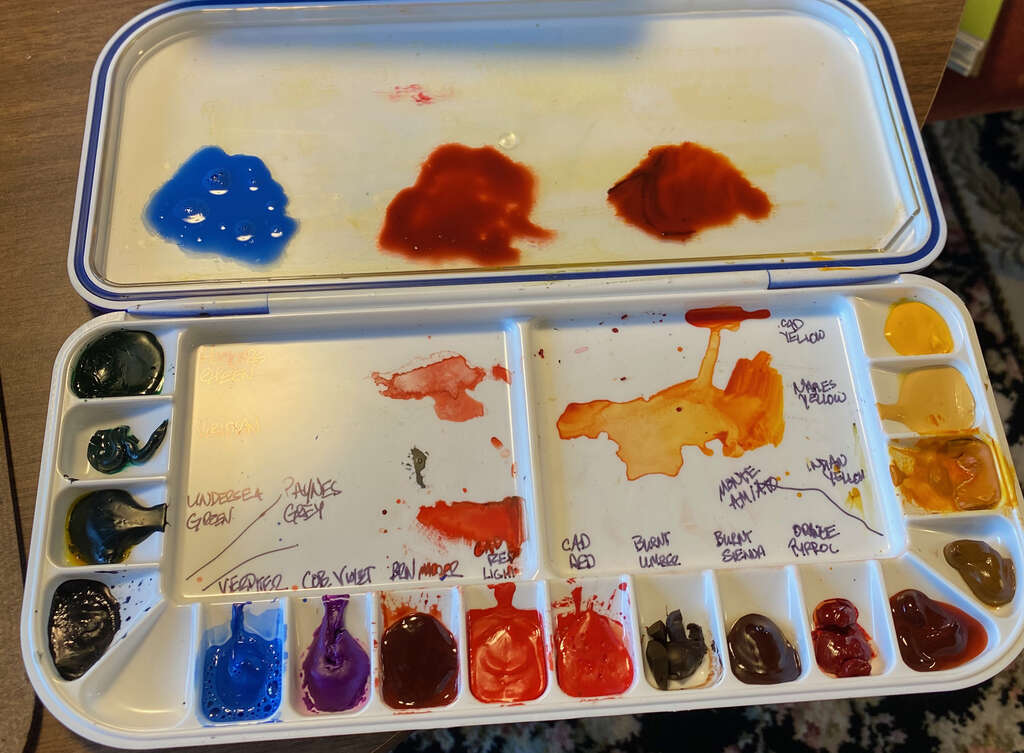 Paint palette with three colours chosen to paint with