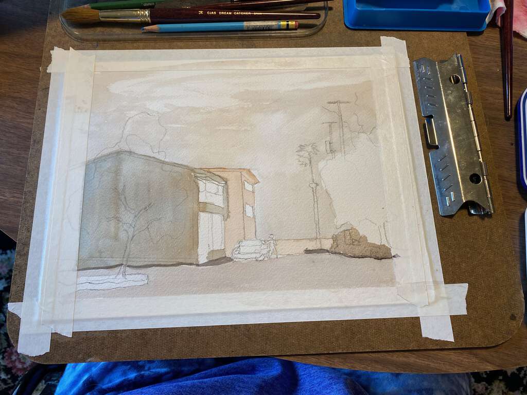 First layers of painting in the sky, ocean, beach, buildings, and streets